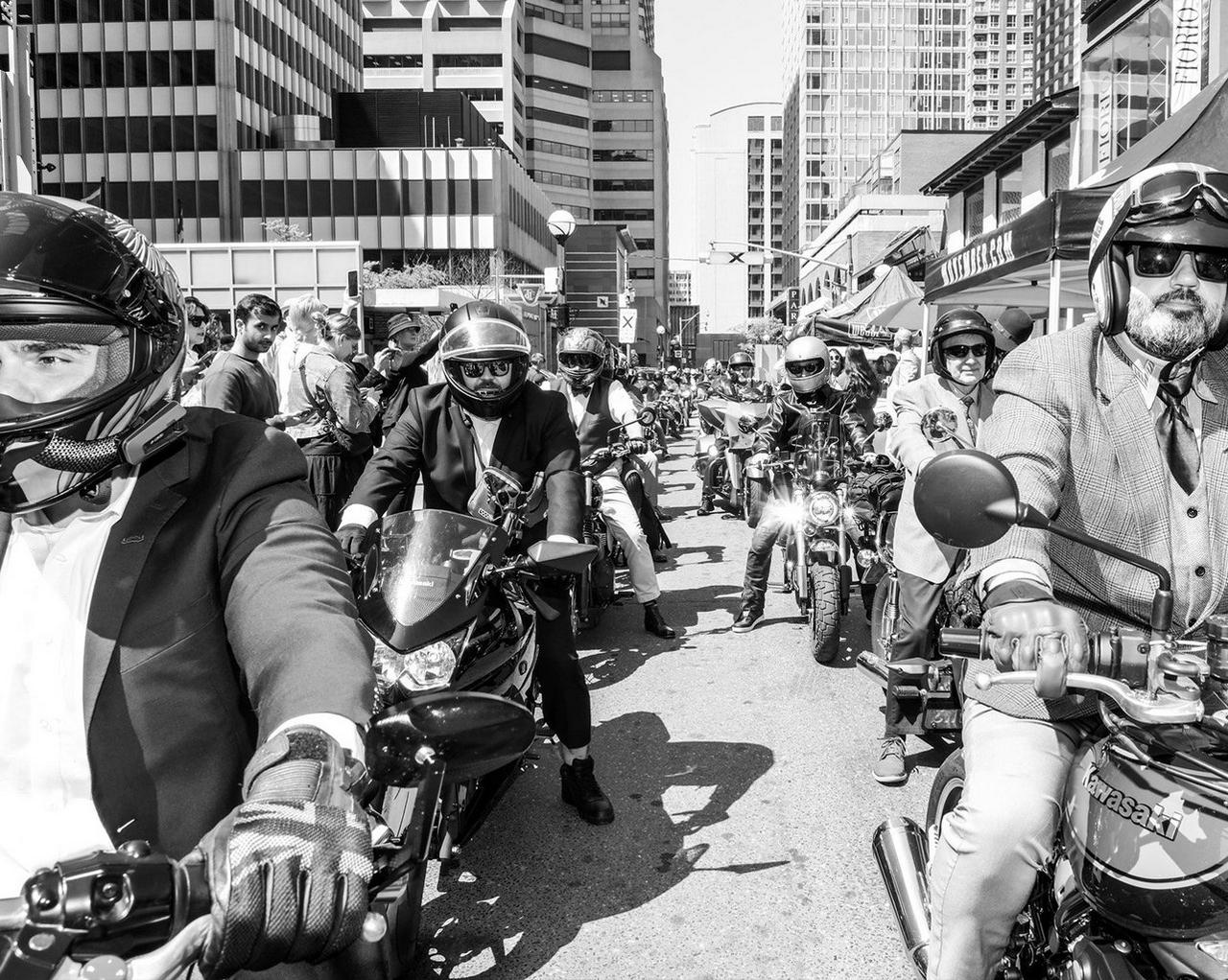 group of gentlemen on motorcycles in the city