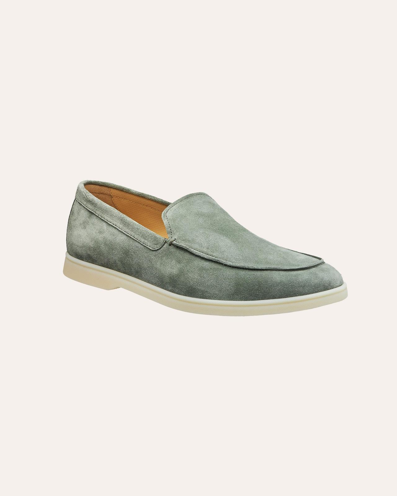 suede henderson loafer on cream background