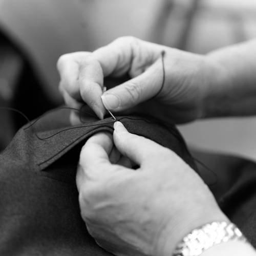 Male model wearing suit signifying made-to-measure