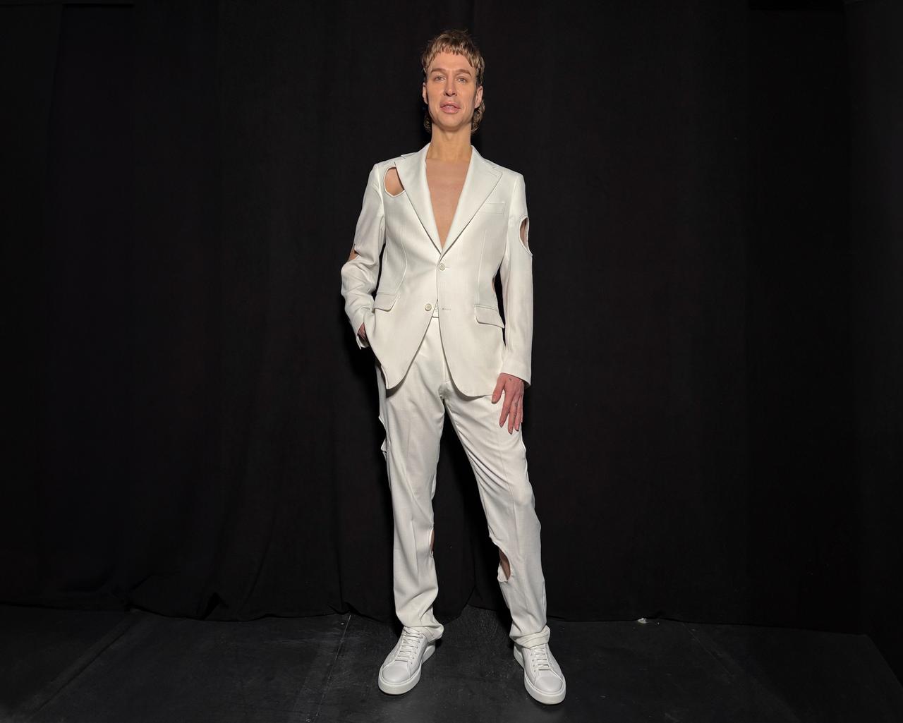 Brook Lyn Hytes wearing a white suit