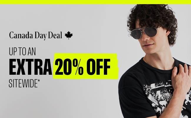 Male model wearing in a black t-shirt and sunglasses signifying Canada Day deal at FinalCut by Harry Rosen