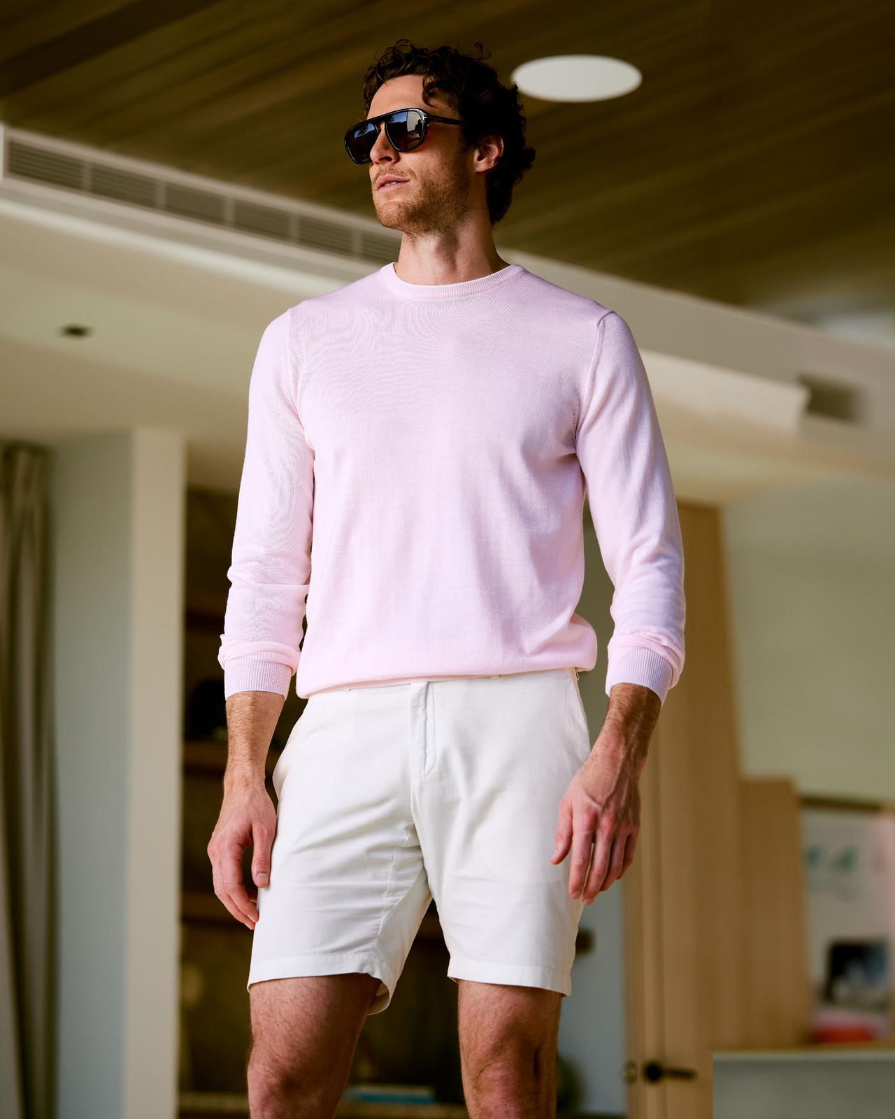 Male model wearing Deke introducing the brand to Harry Rosen