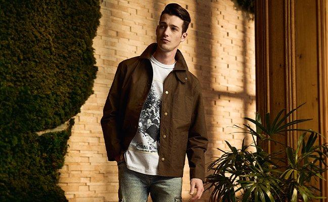 Male model wearing jacket, t-shirt and jeans signifying clothes for any occasion