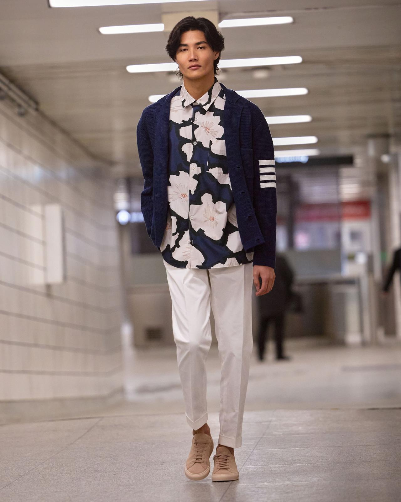 Male model wearing Thom Browne and A.P.C Spring inspired outfit signifying top trends for Spring '25