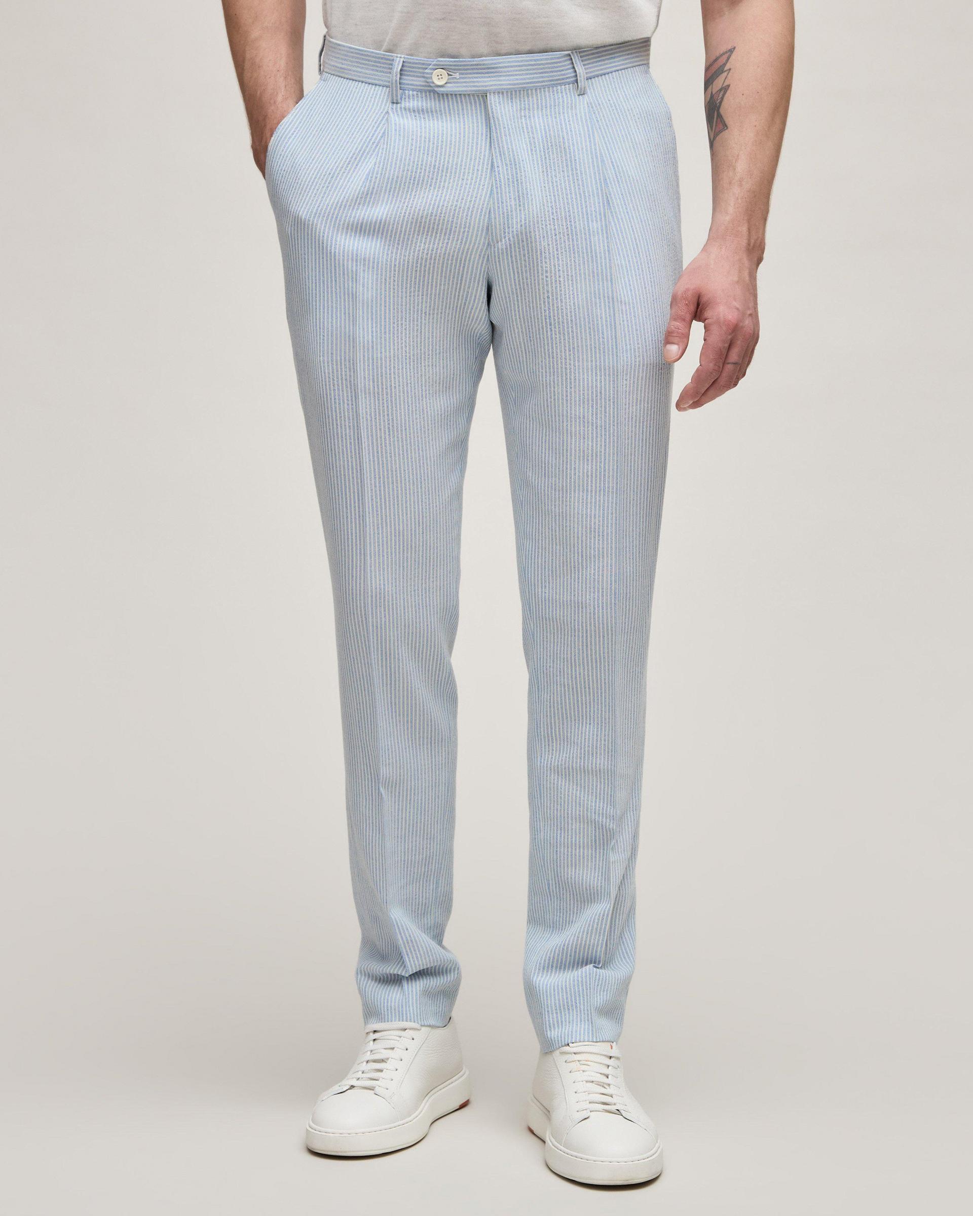 A man wearing vertical stripes Sky blue pants