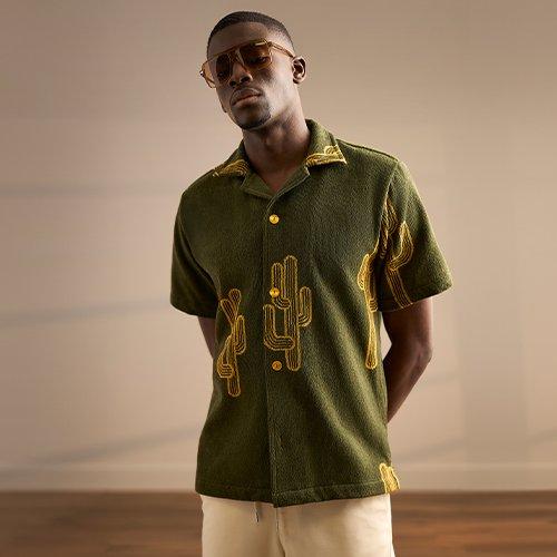 Man in a green cactus casual shirt