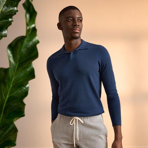 Male model wearing shorts signifying how to style shorts