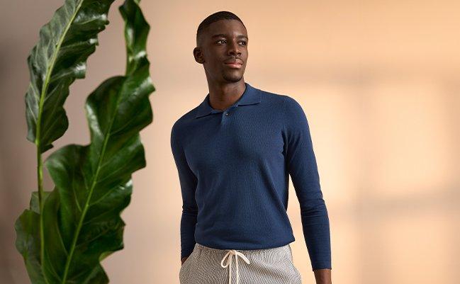 Male model wearing shorts signifying how to style shorts