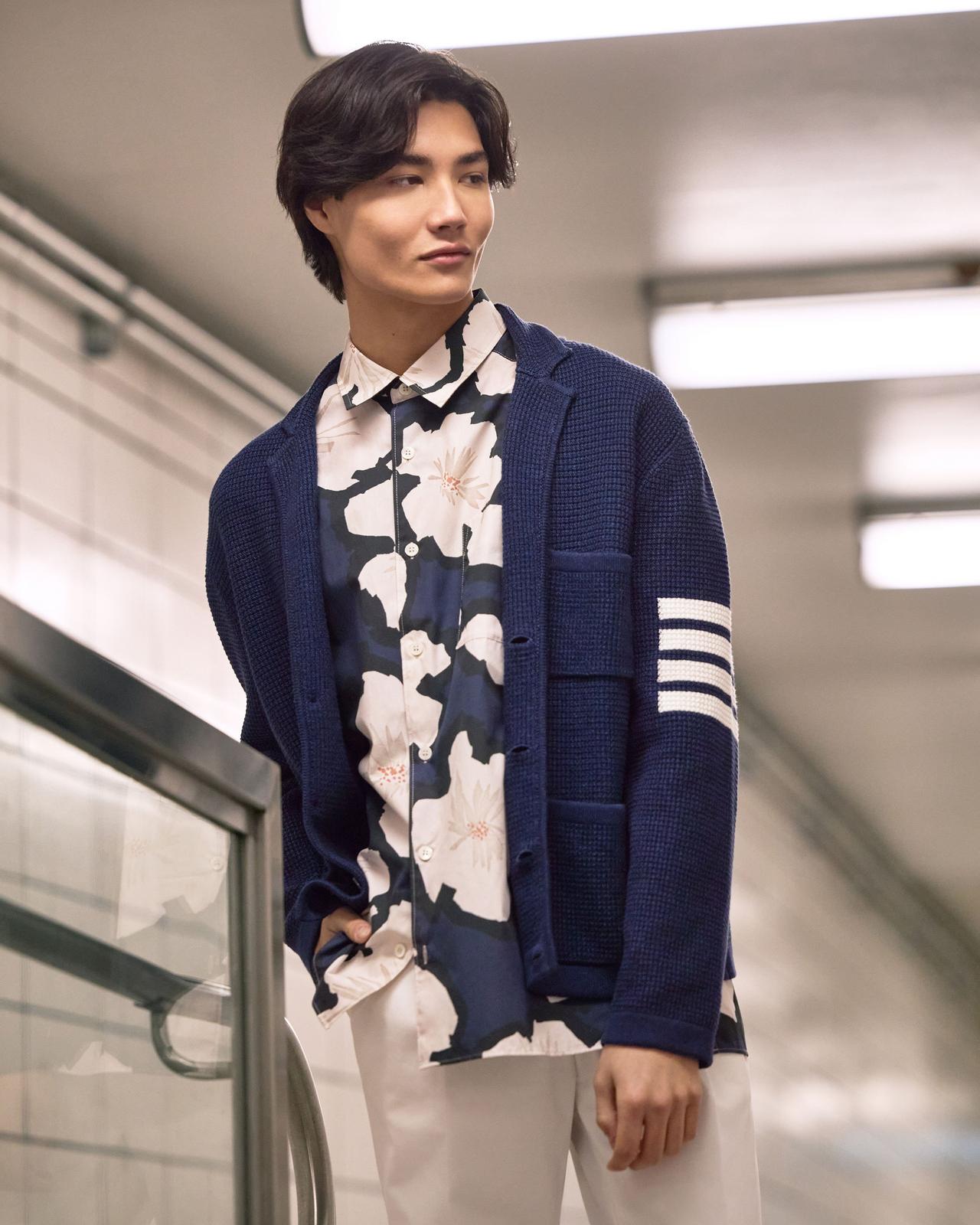 Male model wearing a floral purple casual shirt