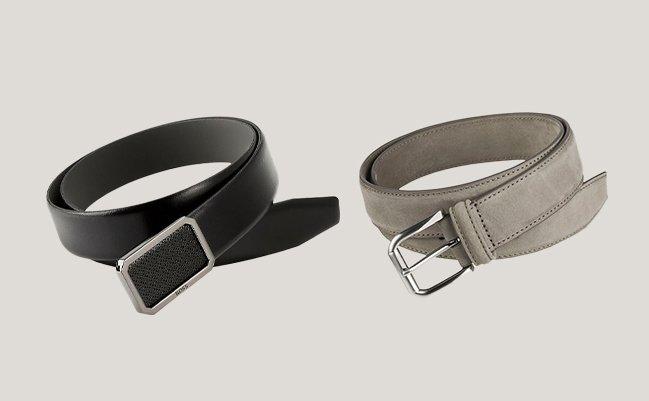 Two different types of belts on a beige background