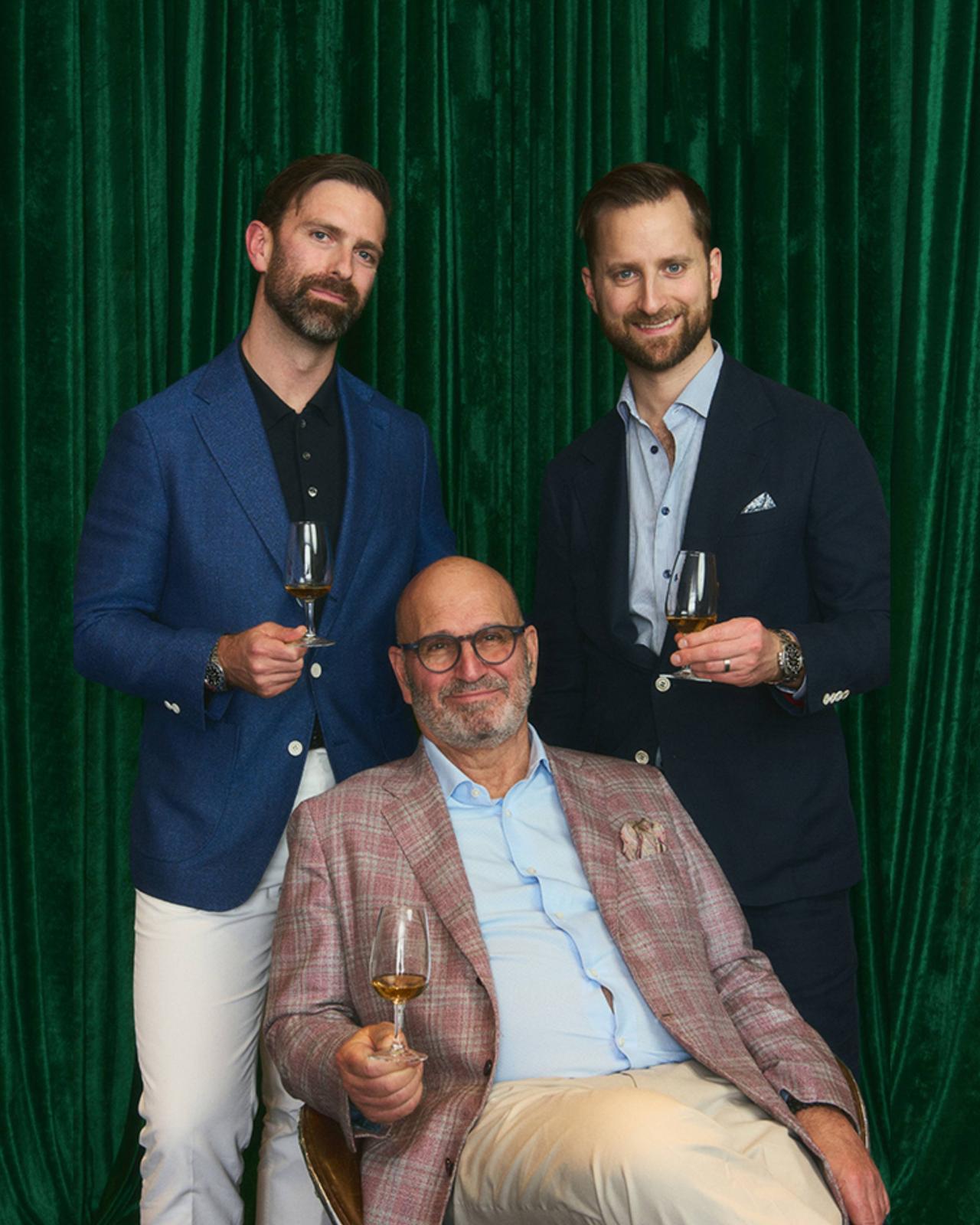 The Rosen family posing for a photo at Sharp X Harry Rosen event