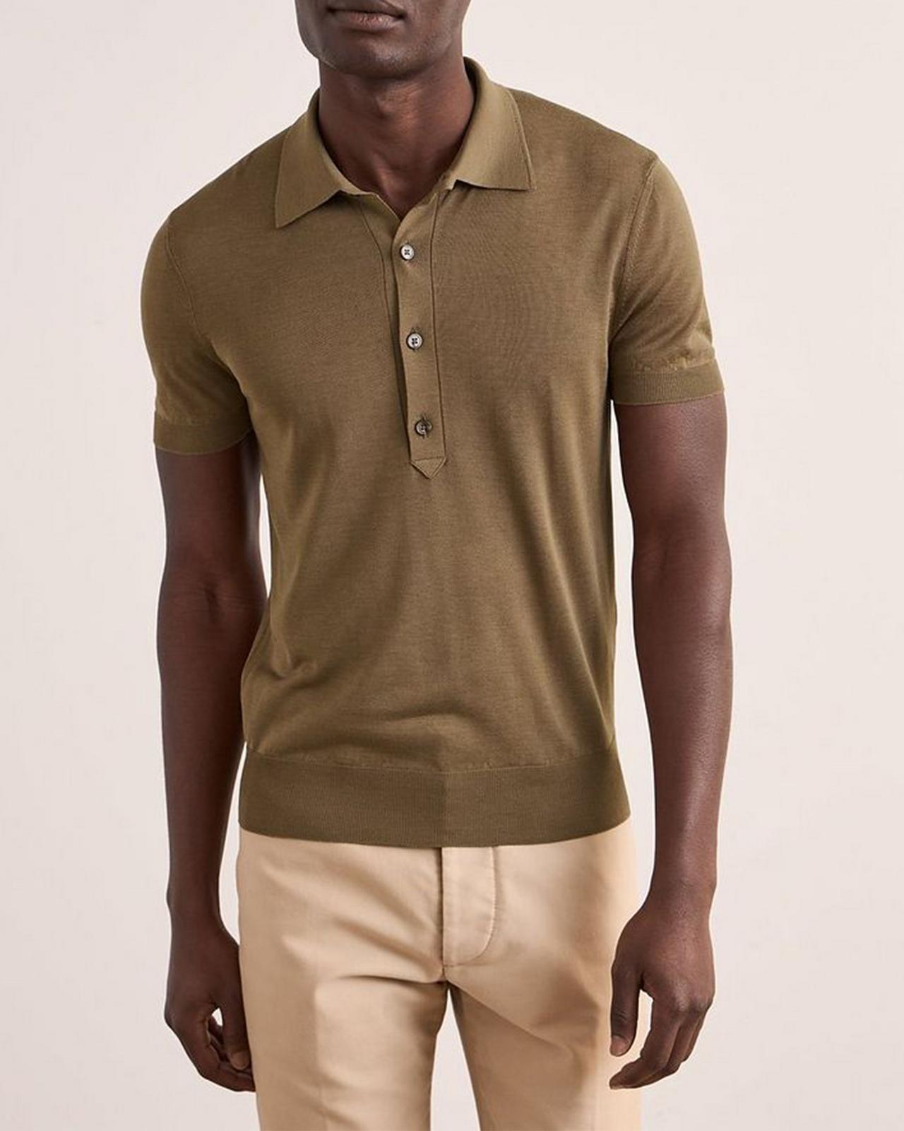 Male model wearing a brown TOM FORD polo