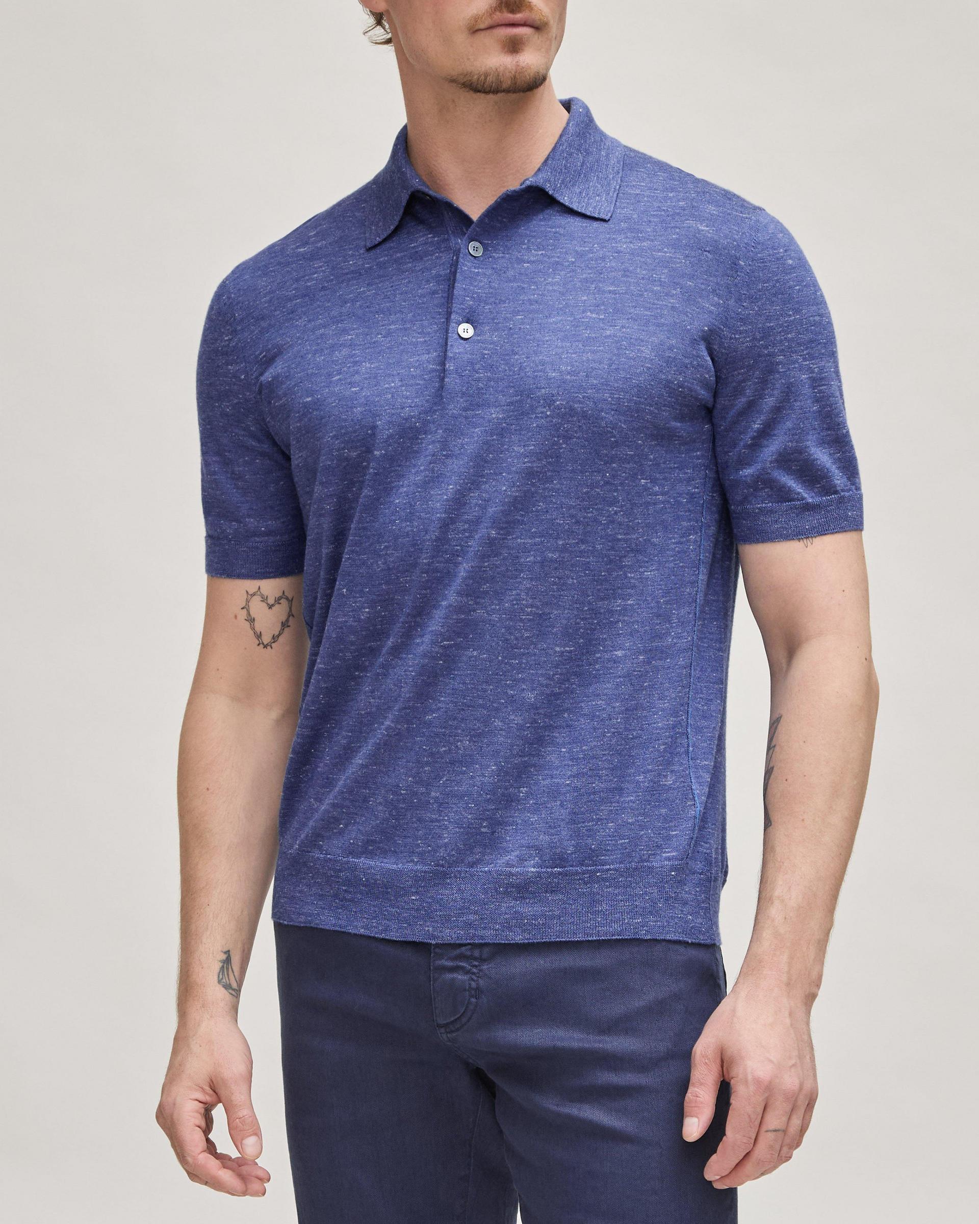Male model wearing a ZEGNA blue polo at FinalCut by Harry Rosen