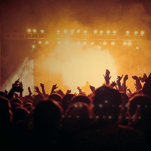 Crowd at a concert signifying what to wear to a concert