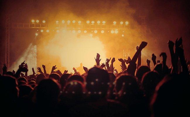 Crowd at a concert signifying what to wear to a concert