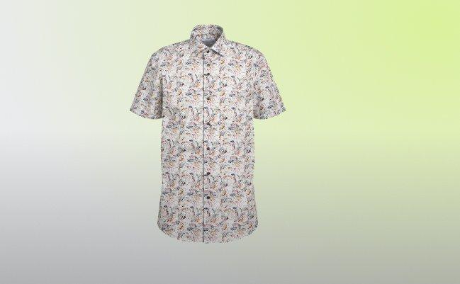 A men's short-sleeve button-down shirt featuring a colorful all-over print in shades of brown, cream, and black