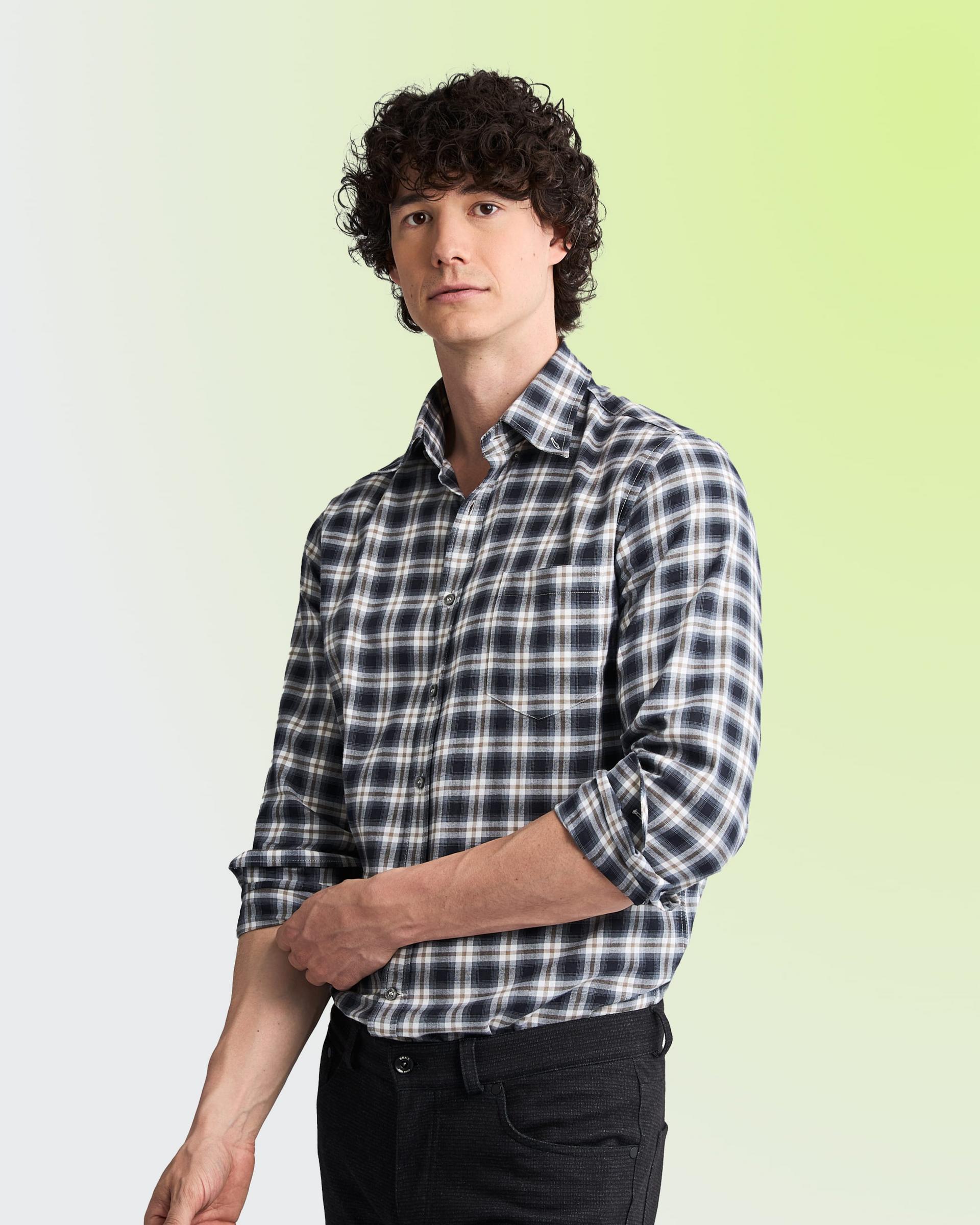 Model wearing a white and black checked casual shirt