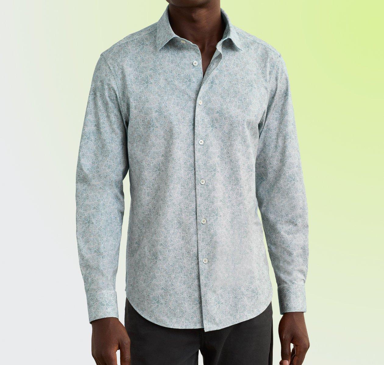 A male model wearing a blue casual shirt