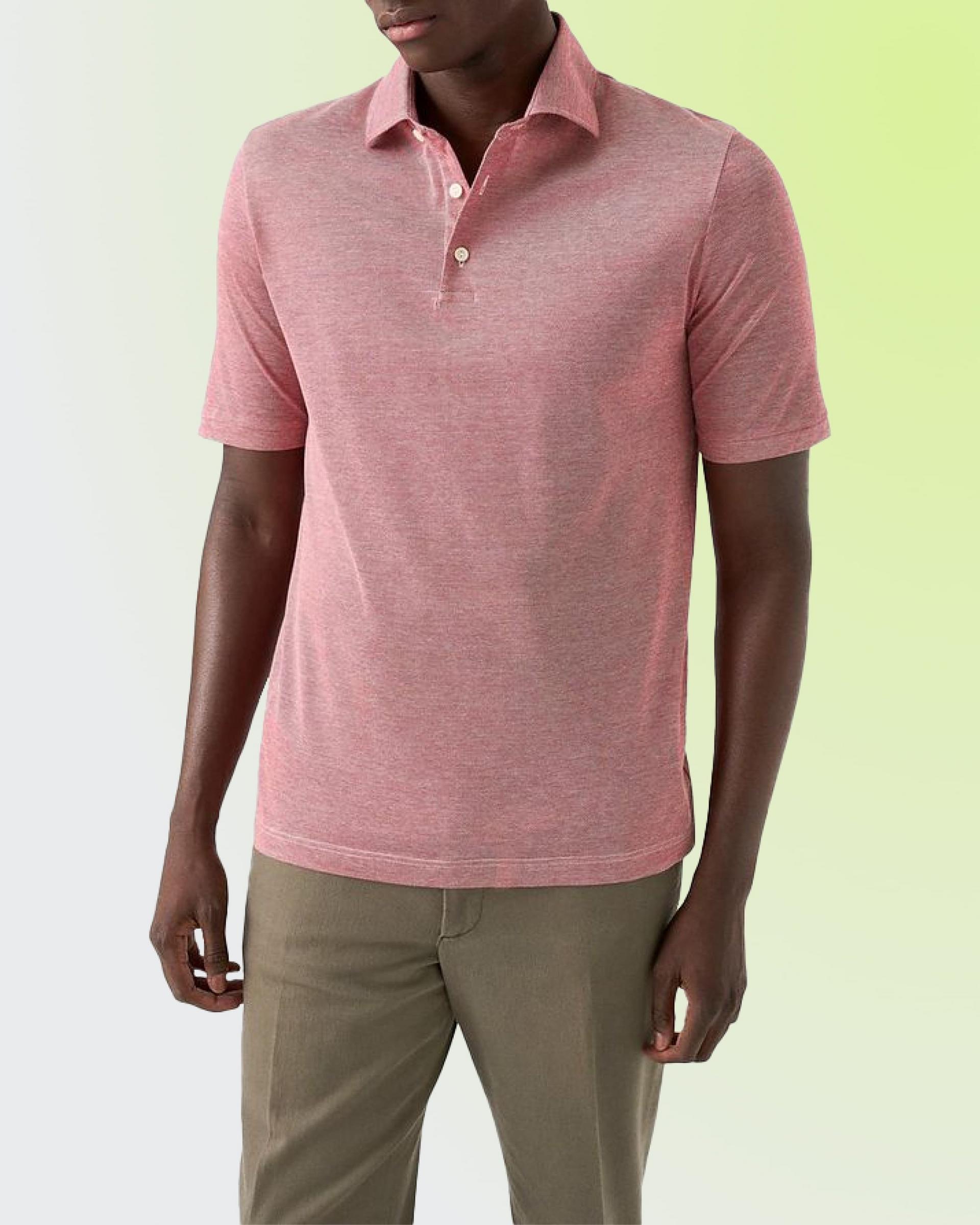 A man wearing a pink polo t-shirt with light brown pant