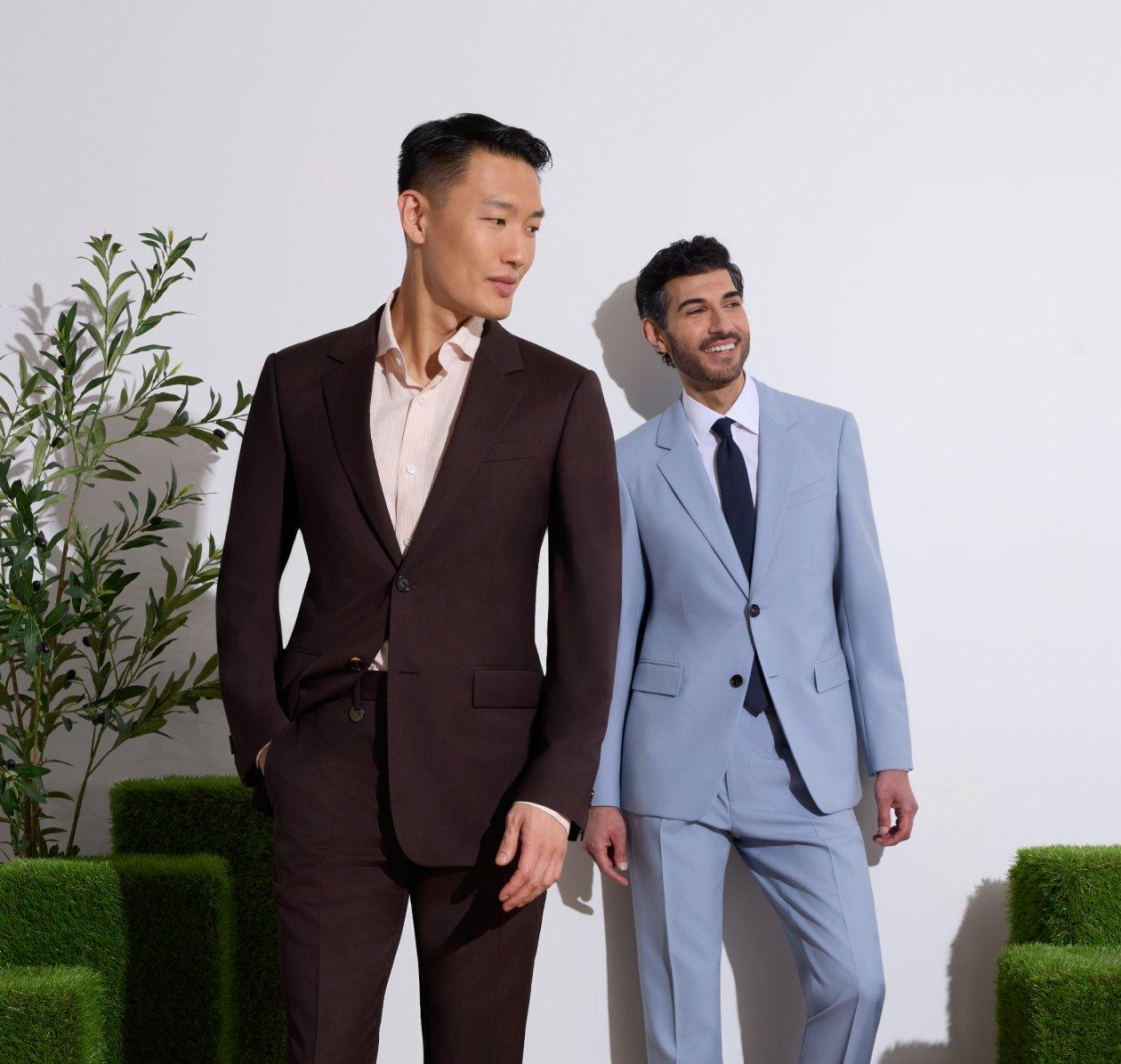 Two Men wearing dark brown and light blue suits