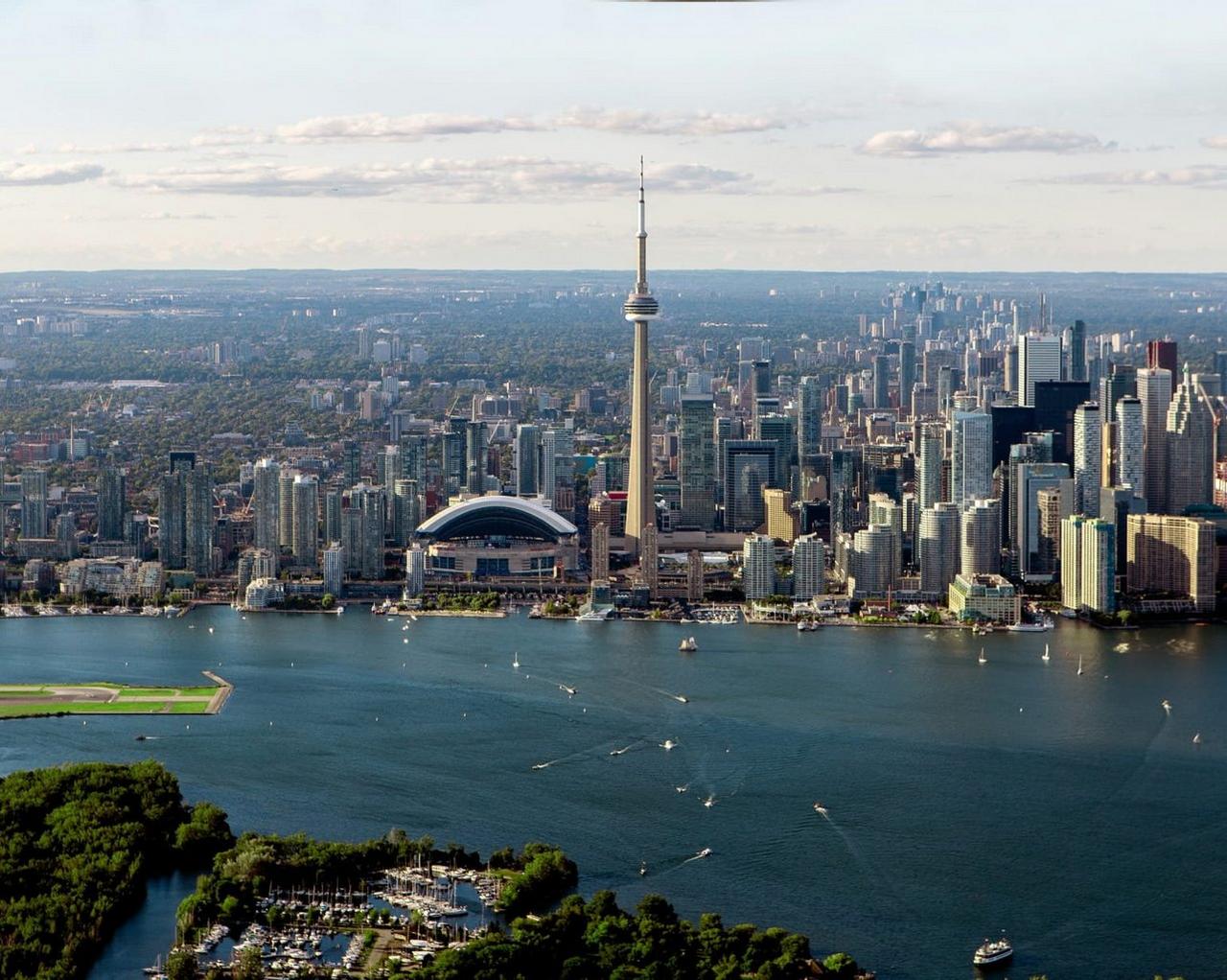 Toronto Skyline, with the iconic CN Tower rising above the city's dense cluster of modern high-rises