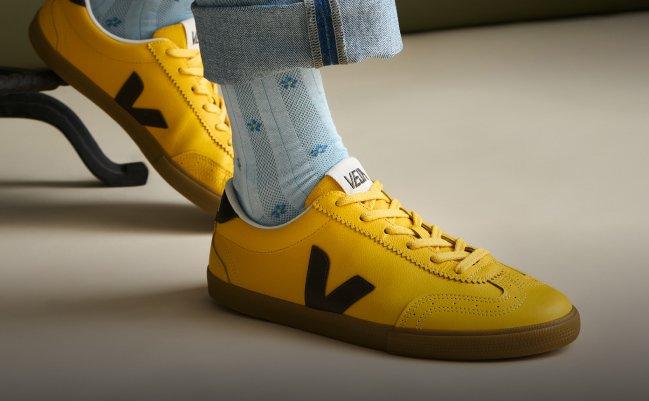 An off-white pair of sneakers