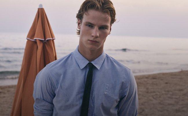 A male model wearing an Emporio Armani dress shirt