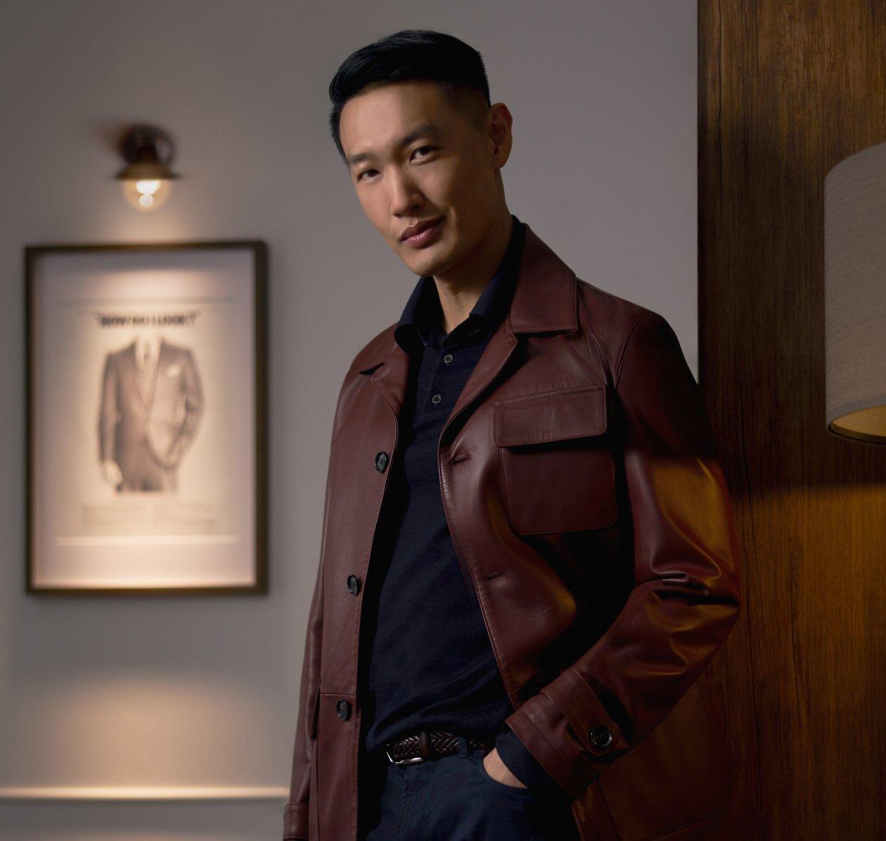 Male model wearing a burgundy leather 
