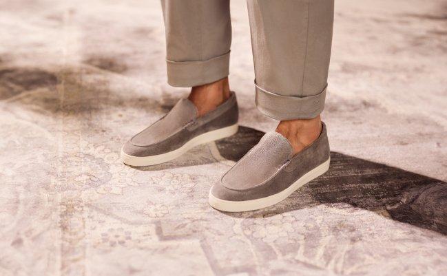 A light grey pair of casual shoes