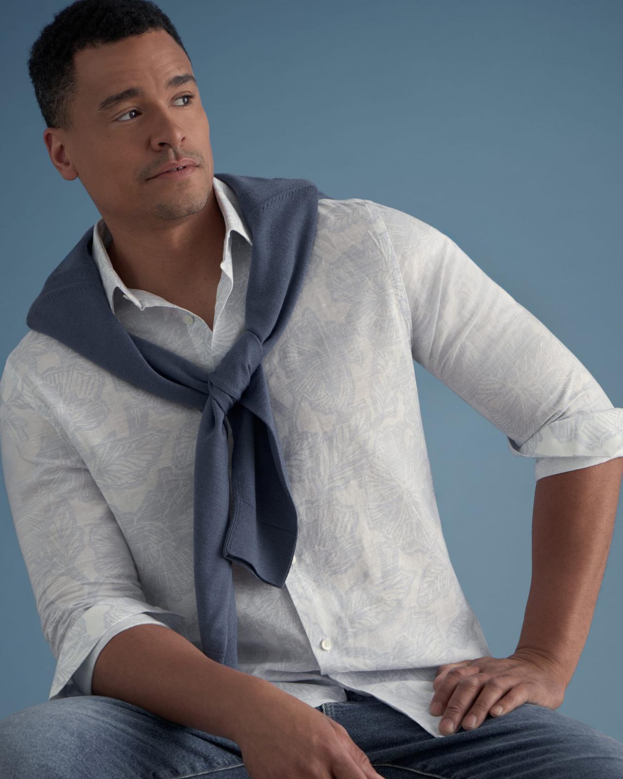 Model wearing a white sport shirt