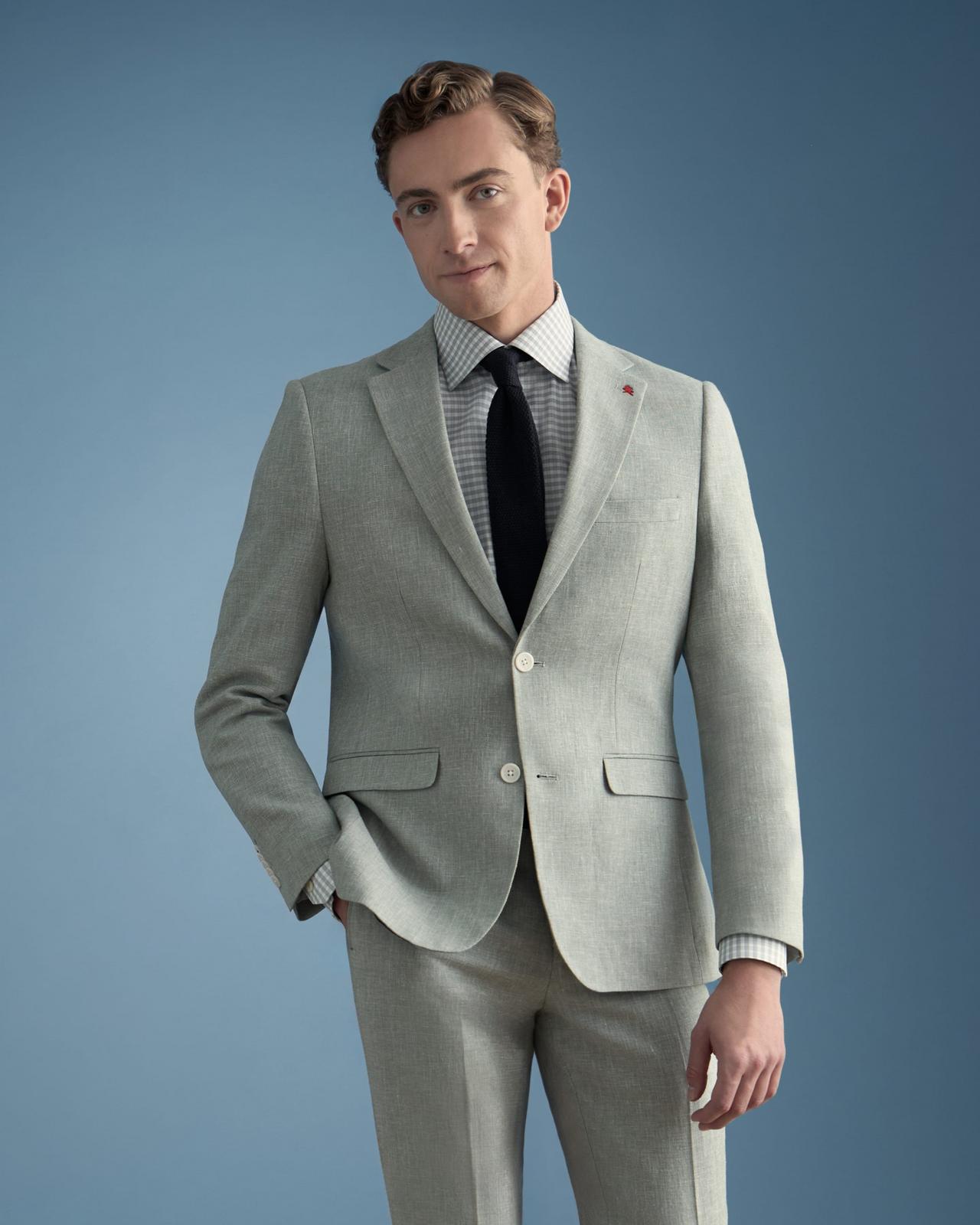 Mannequin wearing a light gray suit