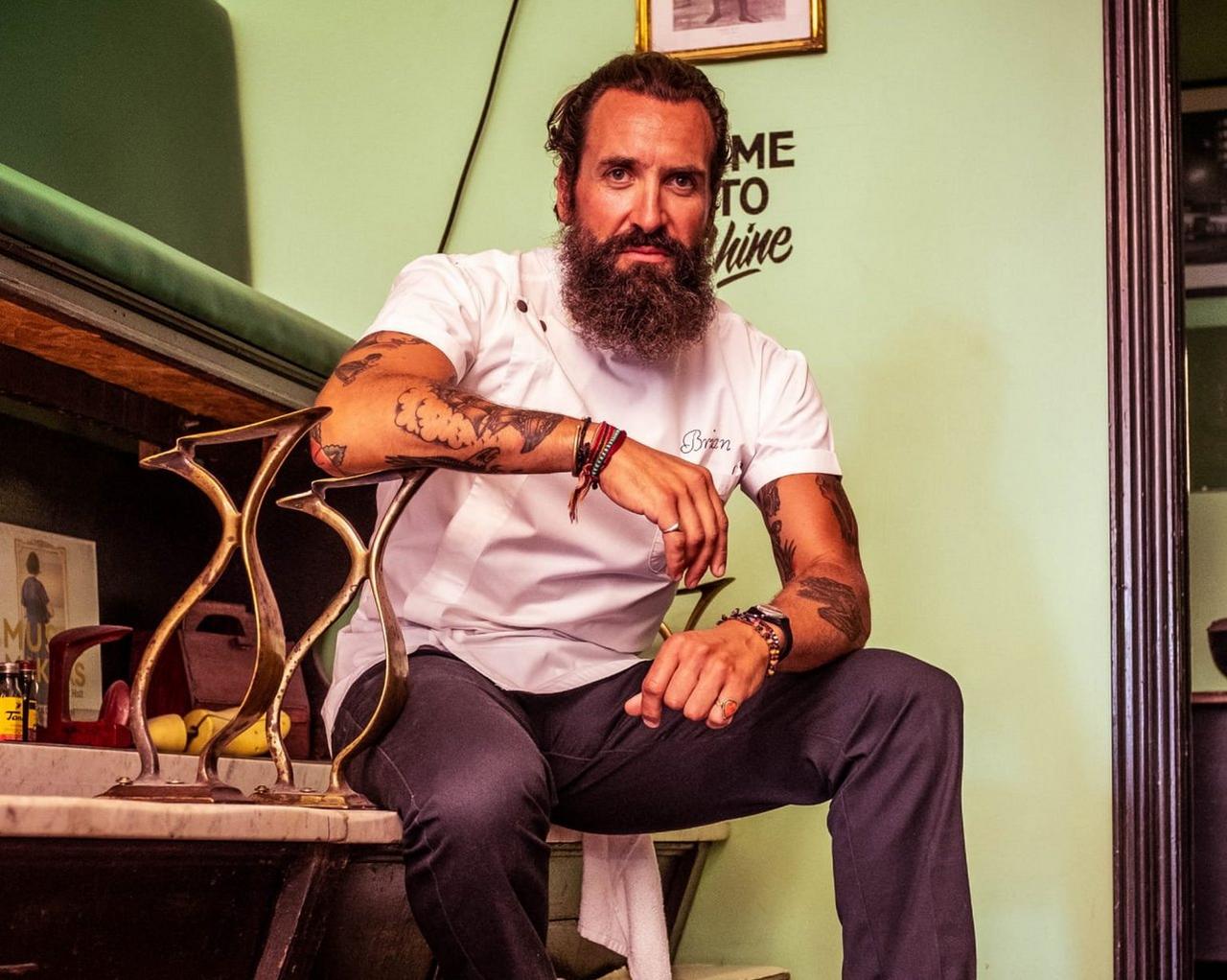 Brian Hurson, a barber