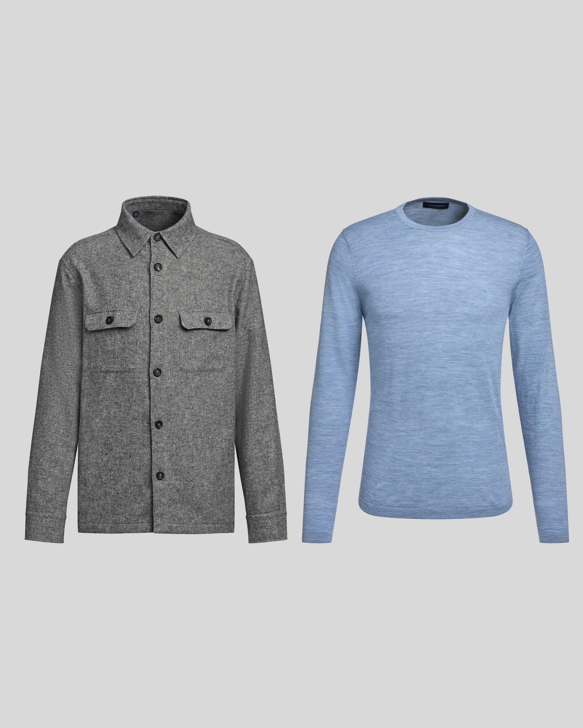 A grey Patrick Assaraf overshirt and a light blue long sleeve shirt styled on a grey background
