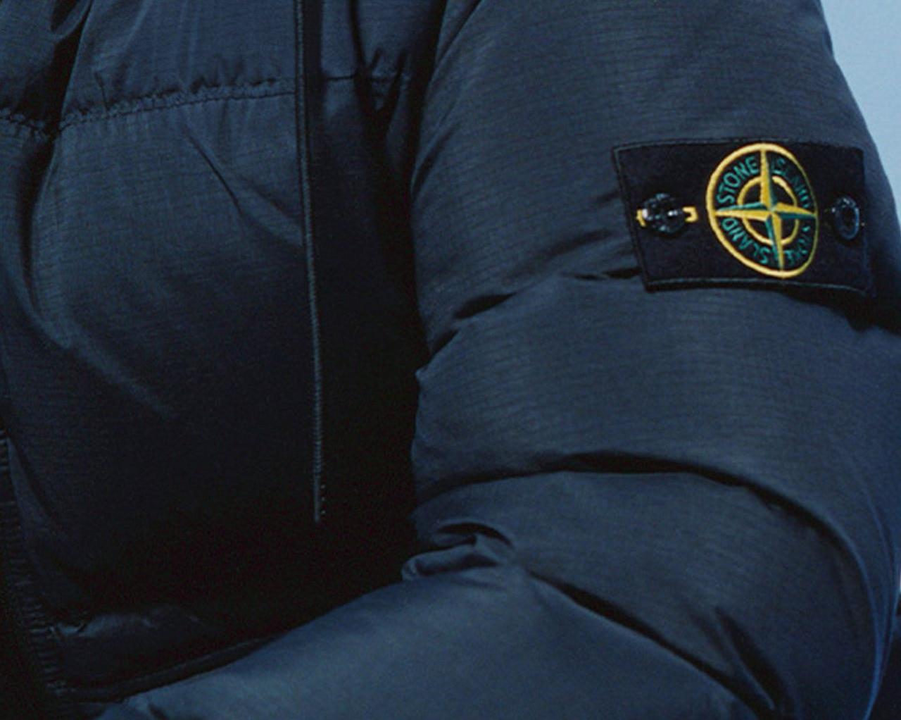 A model wearing a Stone Island cold-weather jacket