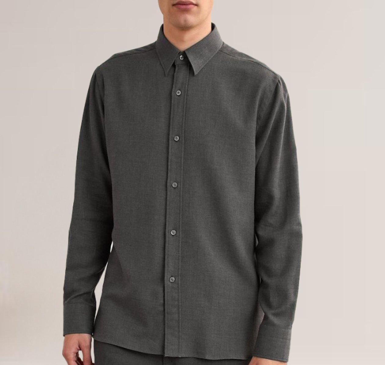 Male model wearing a brown Emporio Armani sports jacket