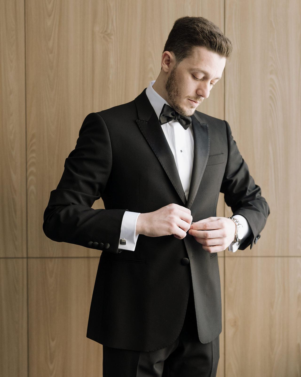 Male model wearing suit signifying made-to-measure