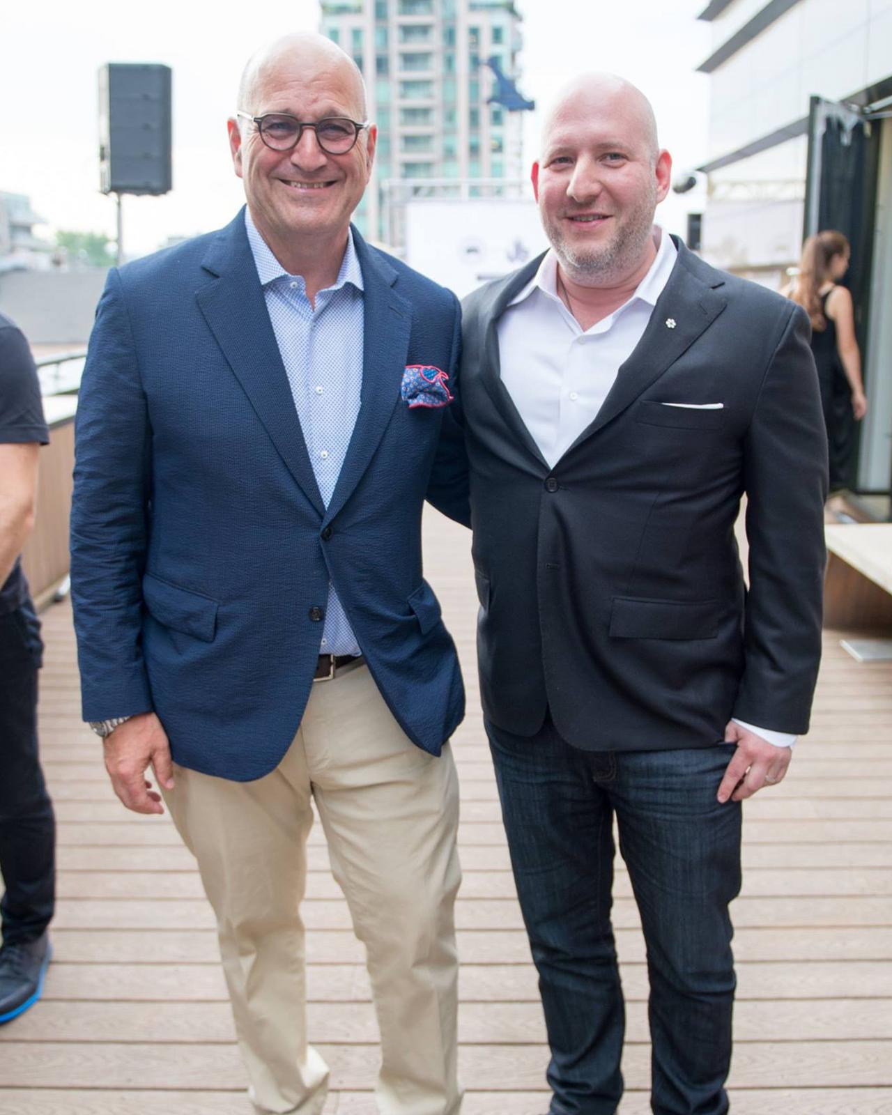 Larry Rosen and Dani Reiss posing for a photo