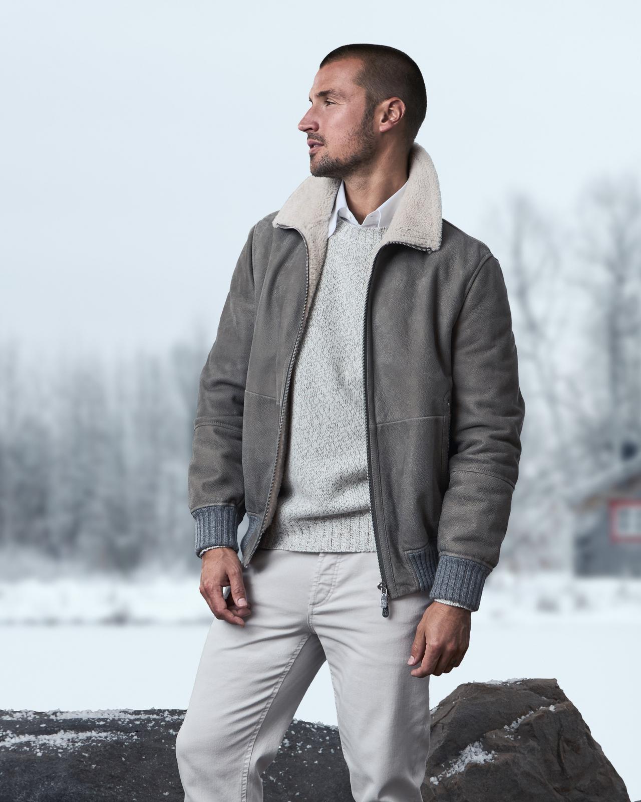 Male model wearing Brunello Cucinelli jacket illustrating aviator jackets