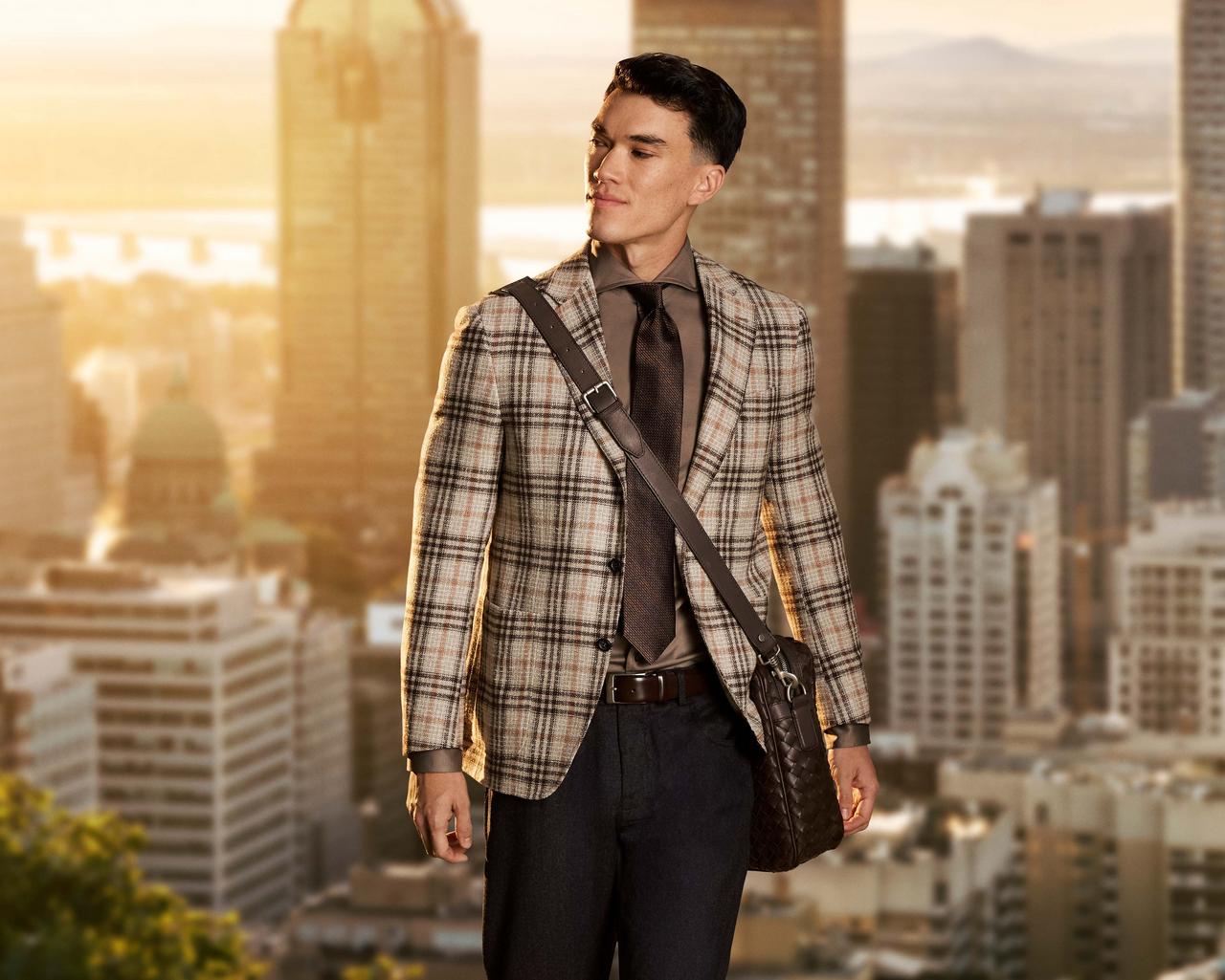 male wearing Canali Kei sport jacket with city in background