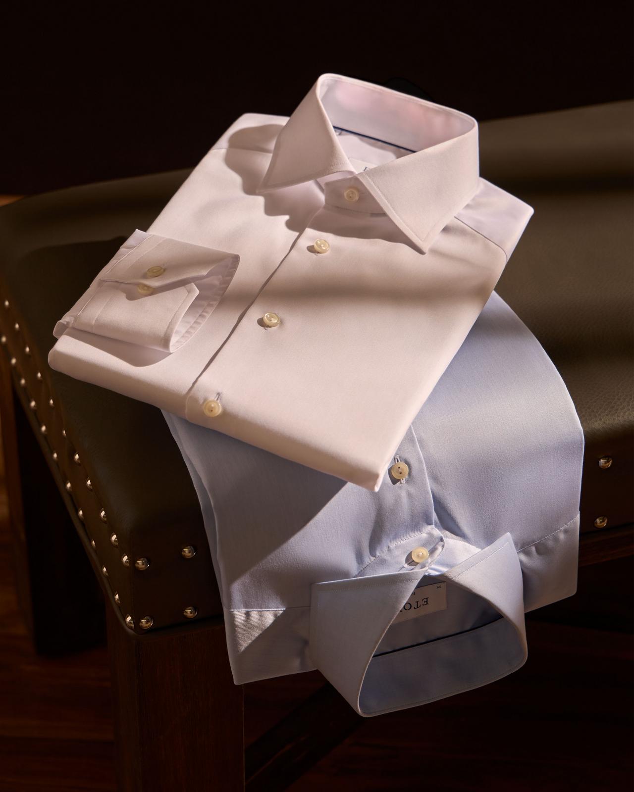 Two dress shirts displayed illustrating dress to impress