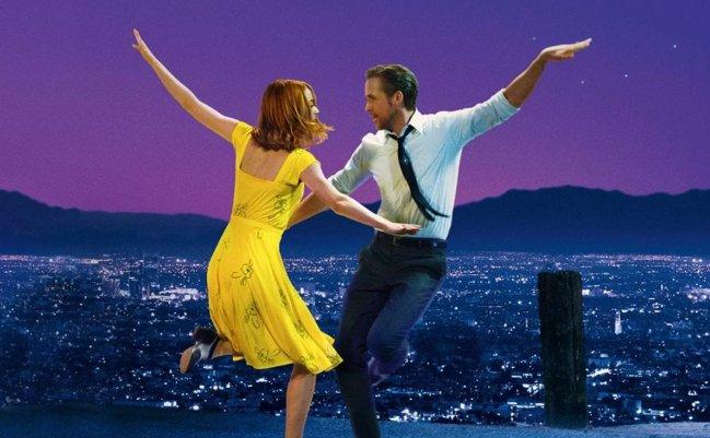 Scene from the movie La La Land featuring two actors dancing together