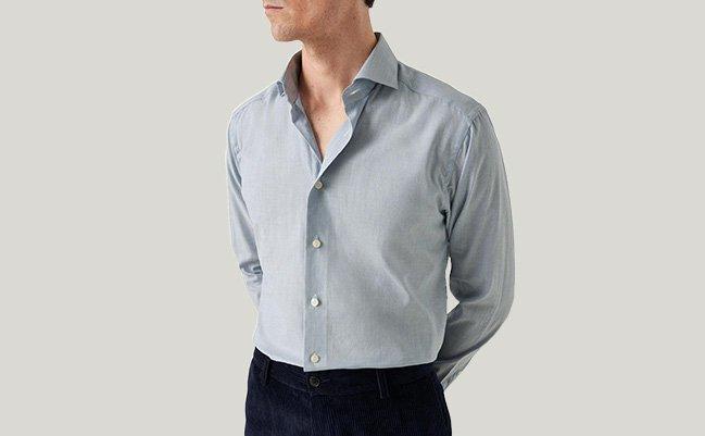 Mannequin masculin portant une chemise grise sans plis de la marque Eton