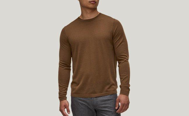 Male model wearing a brown Patrick Assaraf sweater