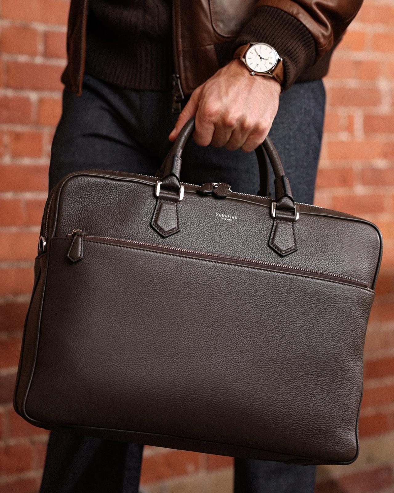 A close up shot of a black briefcase