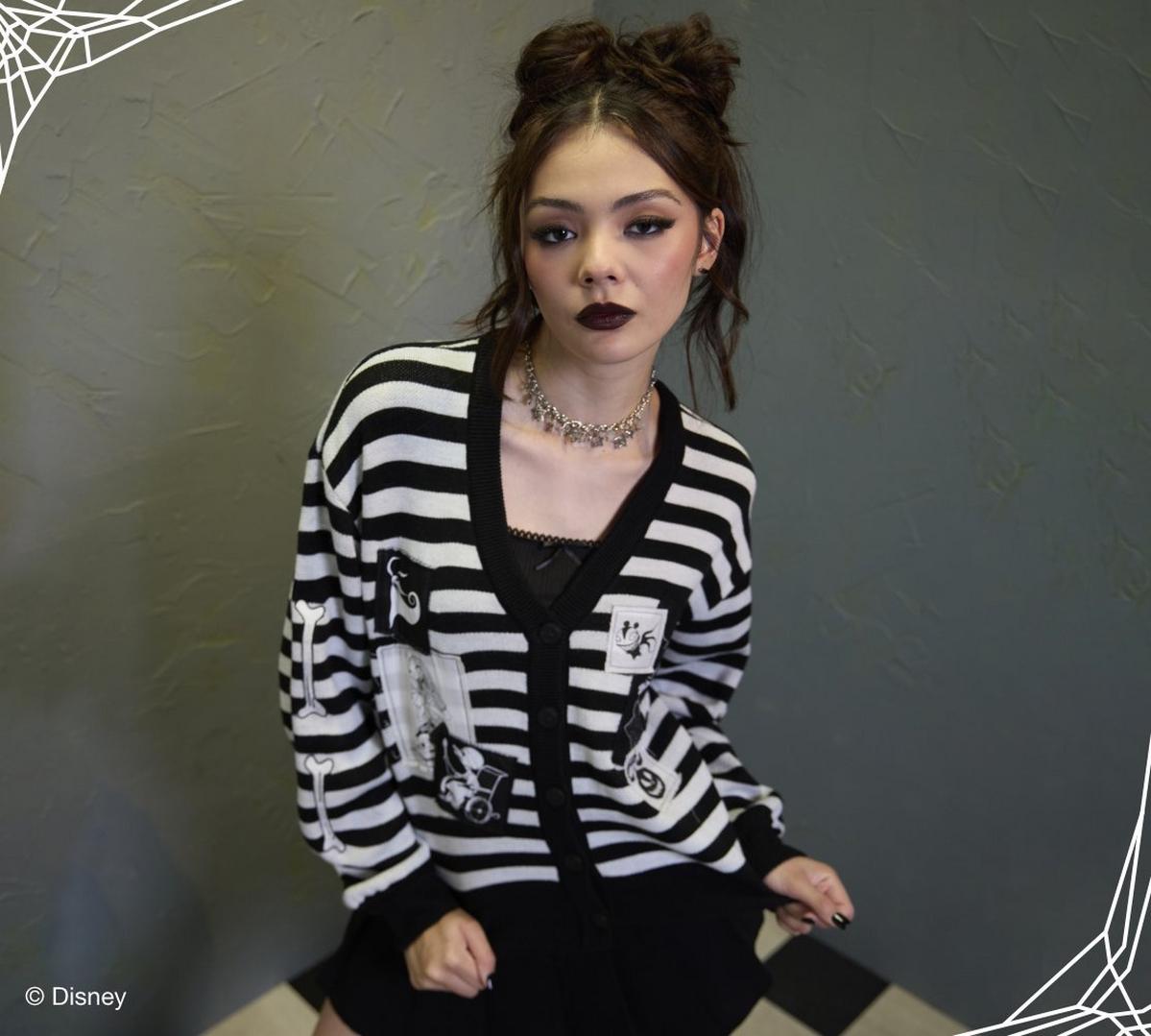 Woman wearing a striped cardigan