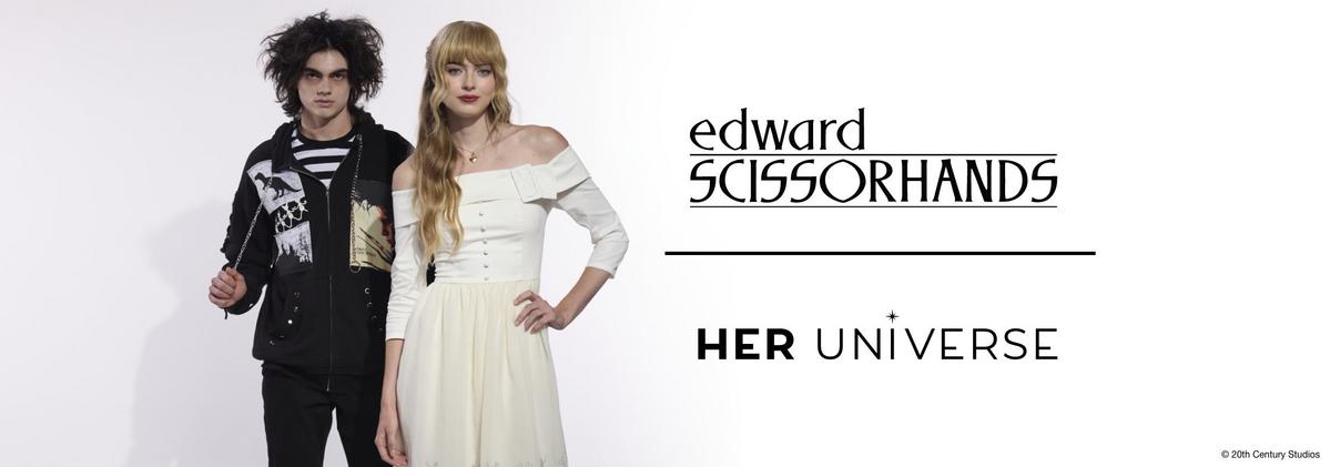 Man in a black hoodie and women wearing a white dress from the Edward Scissorhands collection