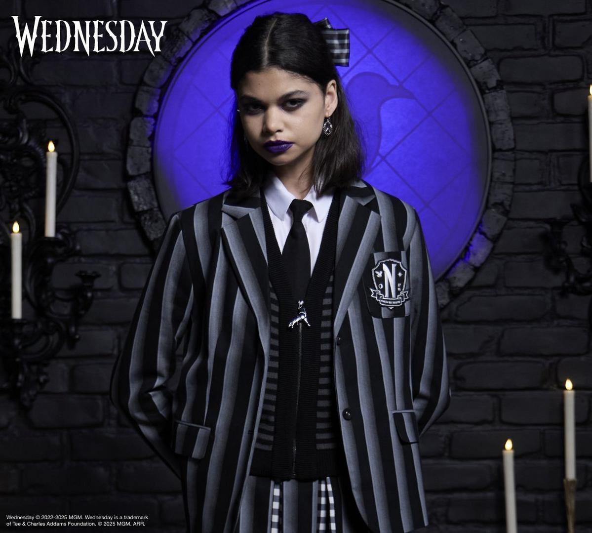 Woman wearing a Wednesday Addams blazer