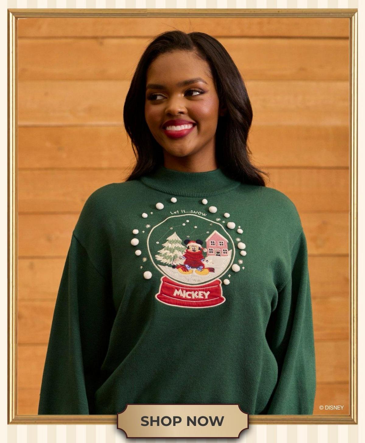 Woman wearing a green sweater. Shop hoodies and sweaters
