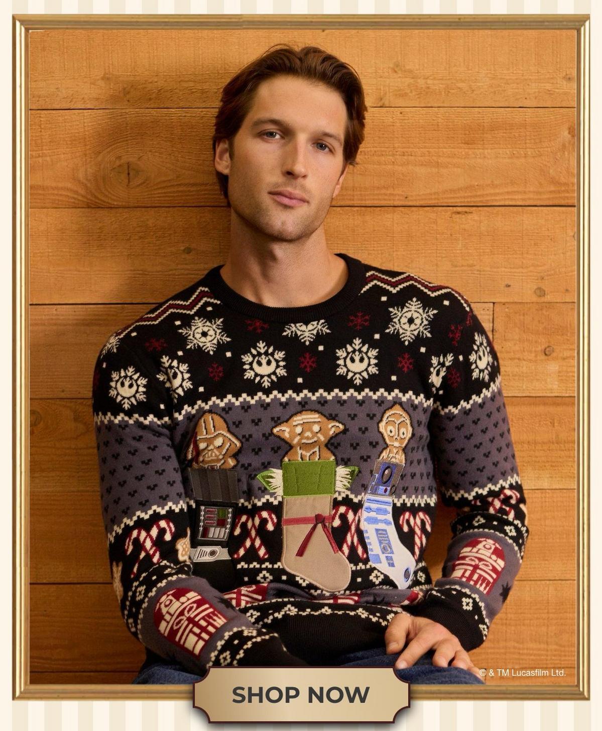 Man wearing a Star Wars Christmas sweater. Shop Our Universe