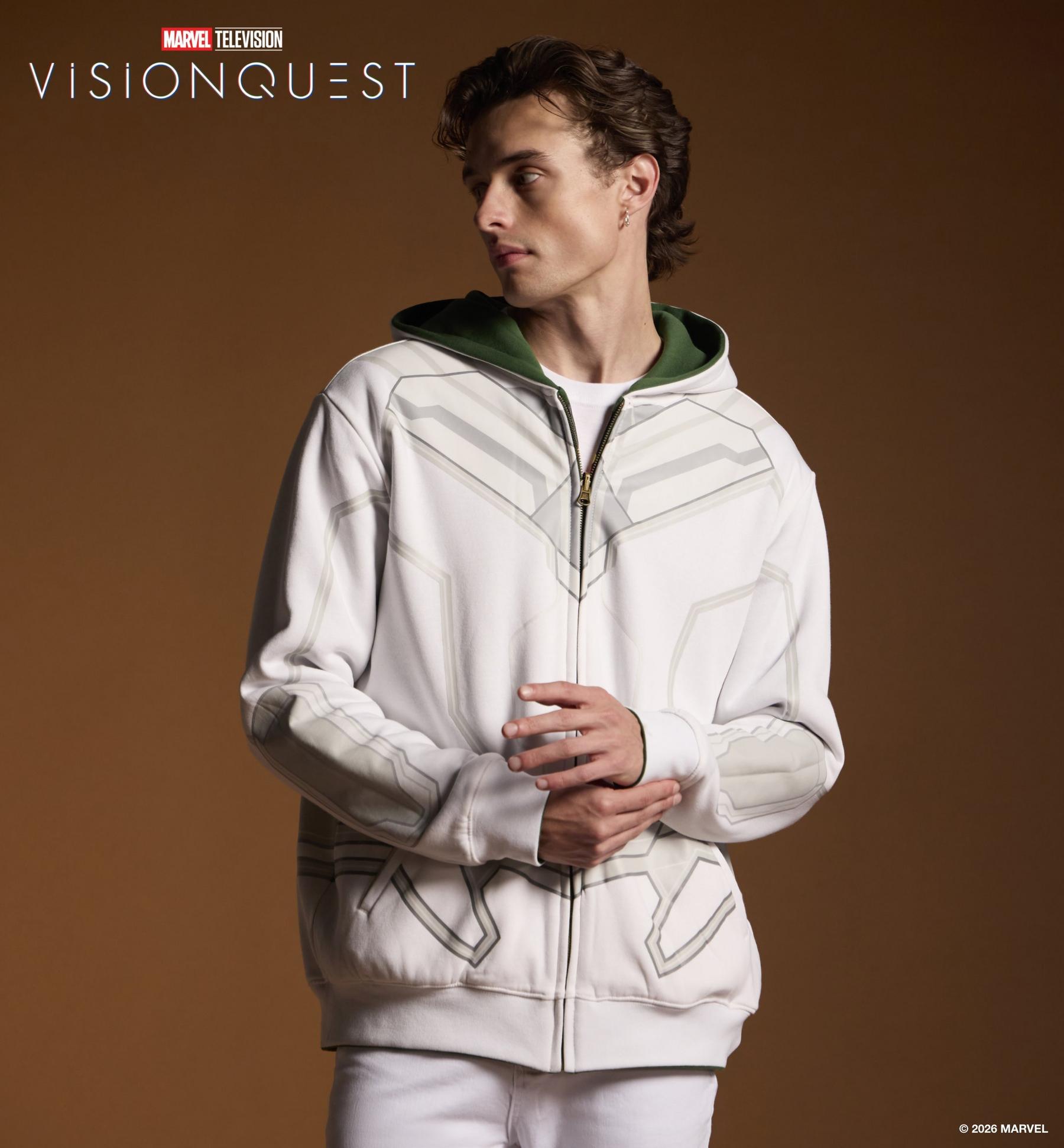 Model wearing Marvel VisionQuest white zip hoodie with geometric line design and green hood. Shop VisionQuest.